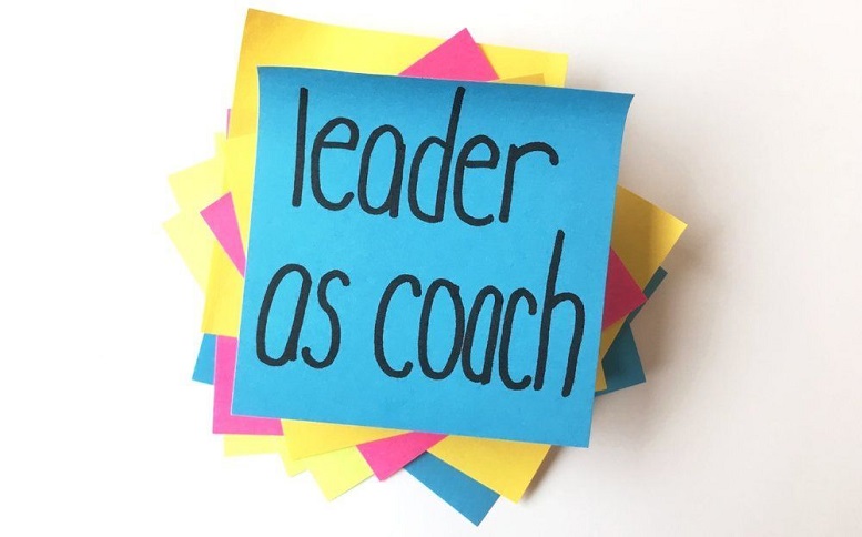 Sticky note with the words: leader as coach