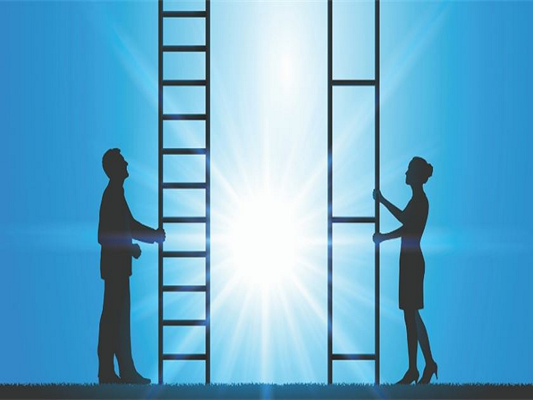 Man and woman standing at ladders